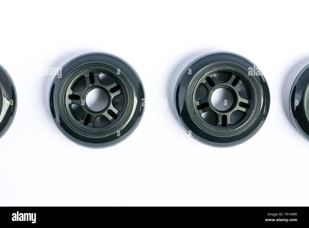 Inline skate wheels, two rollerblade wheels isolated on white background Stock Photo Alamy