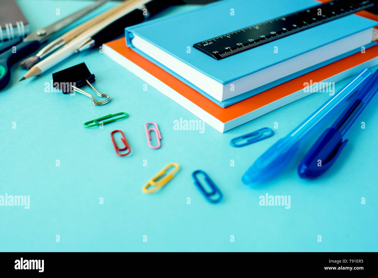 School supplies on blue background. Close up. Stock Photo
