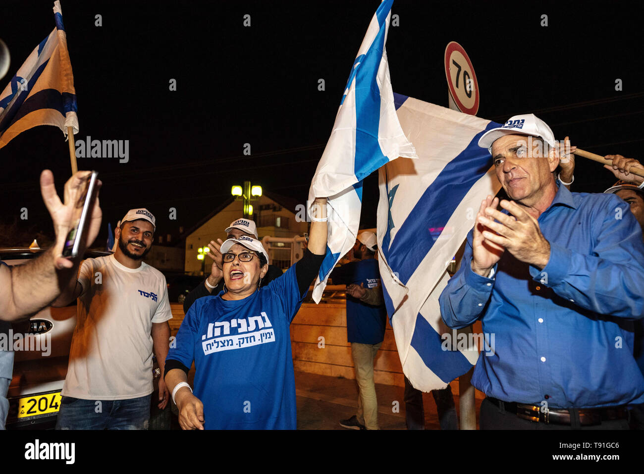 April 7, 2019 - Be'Er Sheva, Israel - Members seen with flags shouting slogans during the rally.Members of the Israeli Likud Party rally in support of Prime Minister, Benjamin Netanyahu, in Be'er Sheva, Israel. Credit: Ronen Tivony/SOPA Images/ZUMA Wire/Alamy Live News Stock Photo