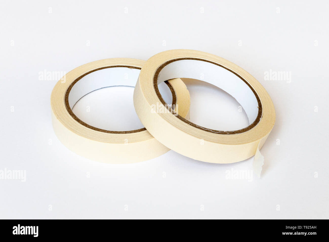 Two rolls of double-sided sticky tape on a blue background, top view Stock  Photo by ndanko
