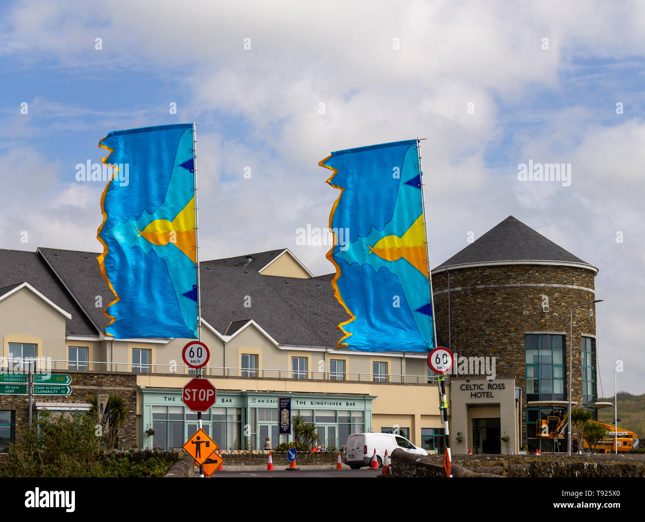 Blue flags or banners flying outside a hotel Stock Photo