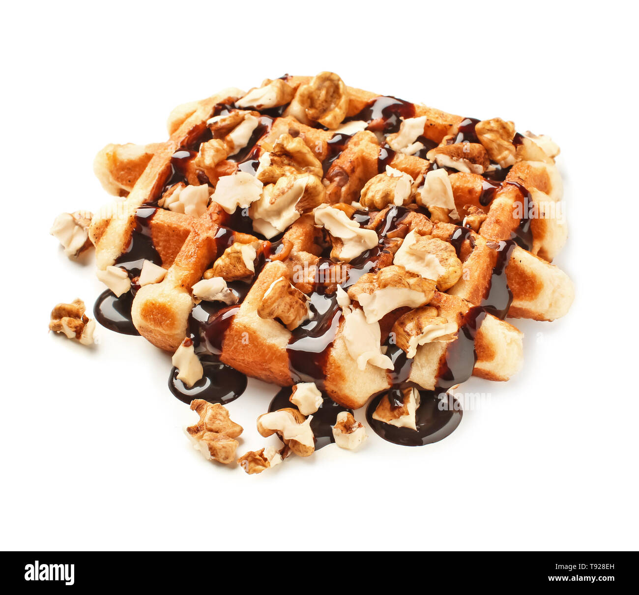 Tasty waffle with nuts and chocolate topping on white background Stock ...