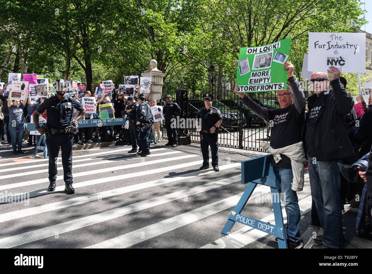 New York, United States. 15th May, 2019. Anti-fur activists rallied in front of City Hall in New York City before the scheduled Council hearing to ban the sale of fur in New York City. Opposite the activists, fur store owners alongside their employees rallied against the proposed ban. A ban on fur sales, they fear, would create unemployment and be detrimental to small business owners. Credit: Gabriele Holtermann-Gorden/Pacific Press/Alamy Live News Stock Photo