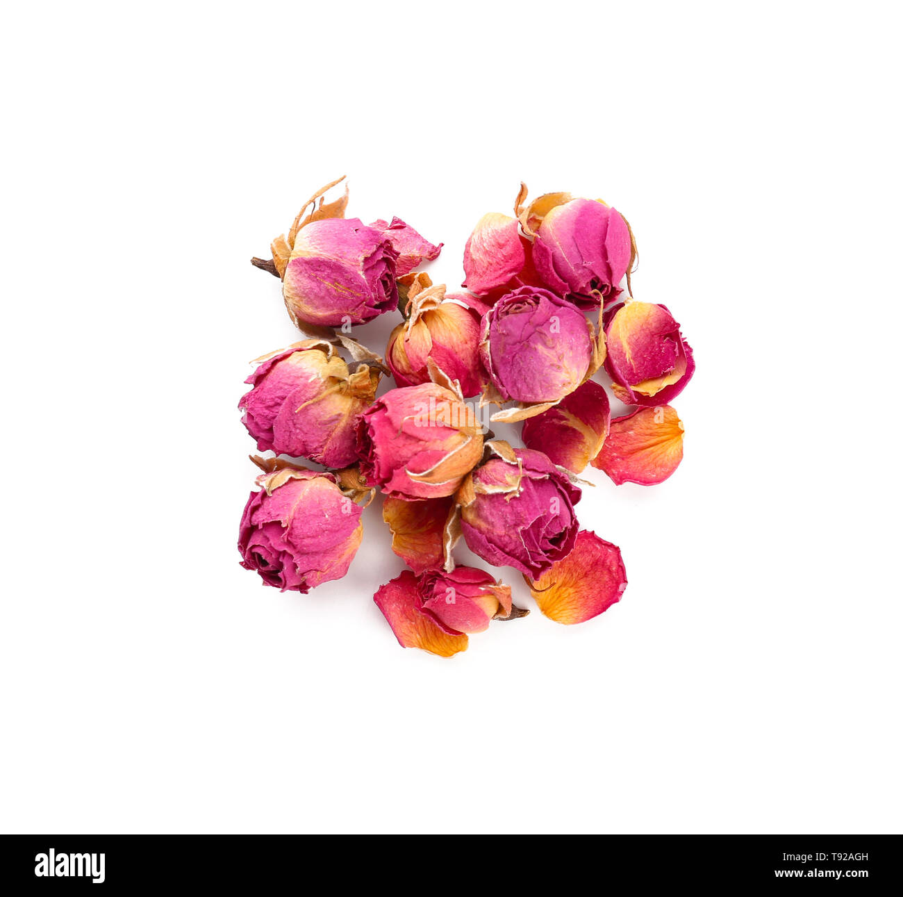 Dried roses on white background Stock Photo - Alamy