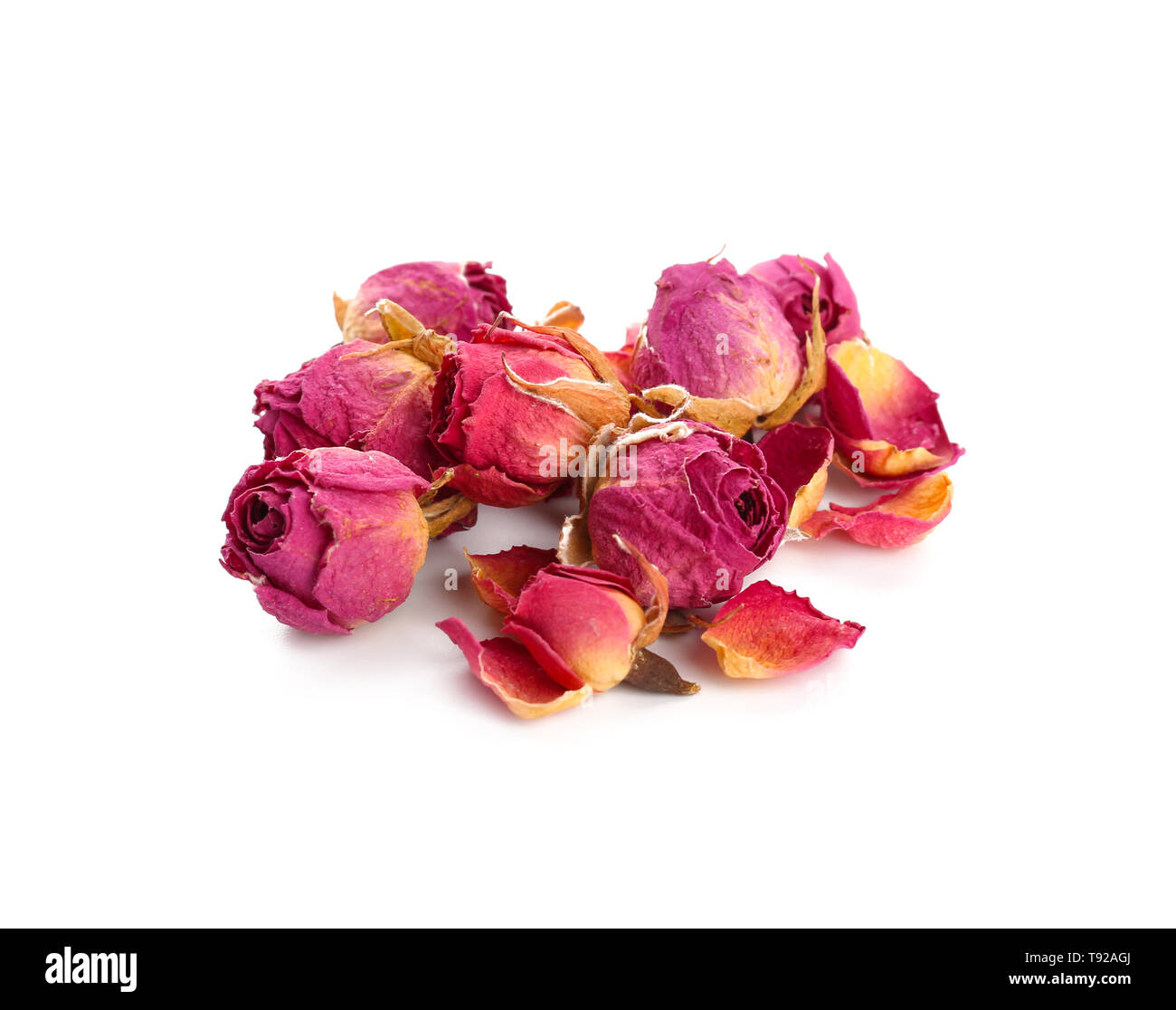 Dried roses on white background Stock Photo - Alamy