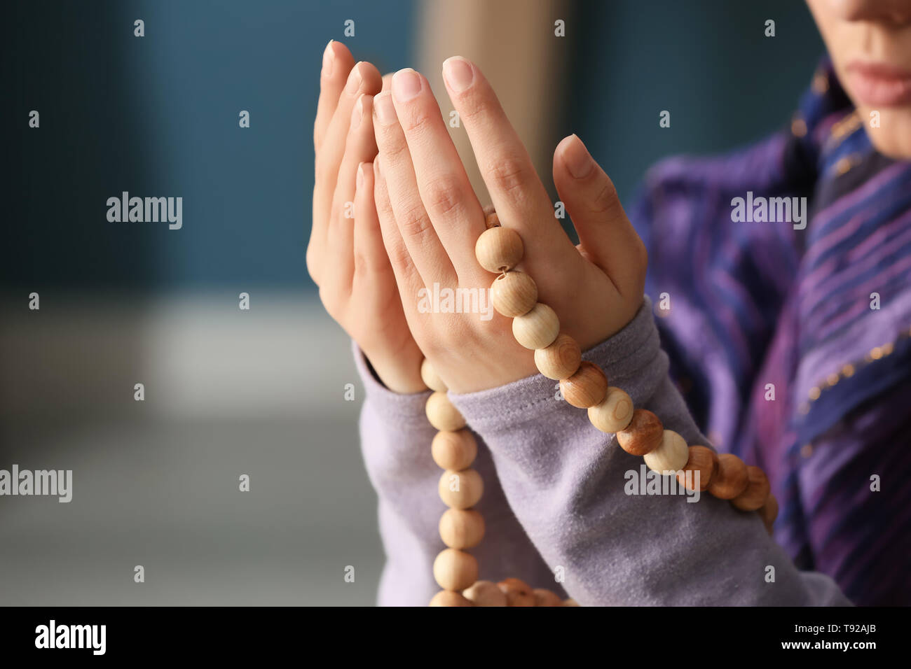 Young woman with a rosary hi-res stock photography and images - Alamy