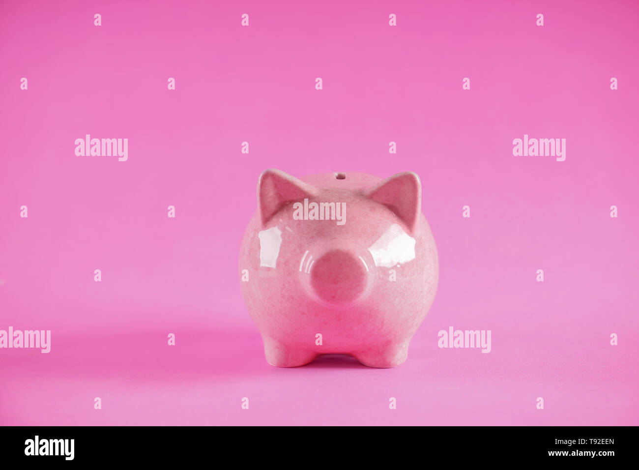 Ceramic piggy bank on color background Stock Photo - Alamy