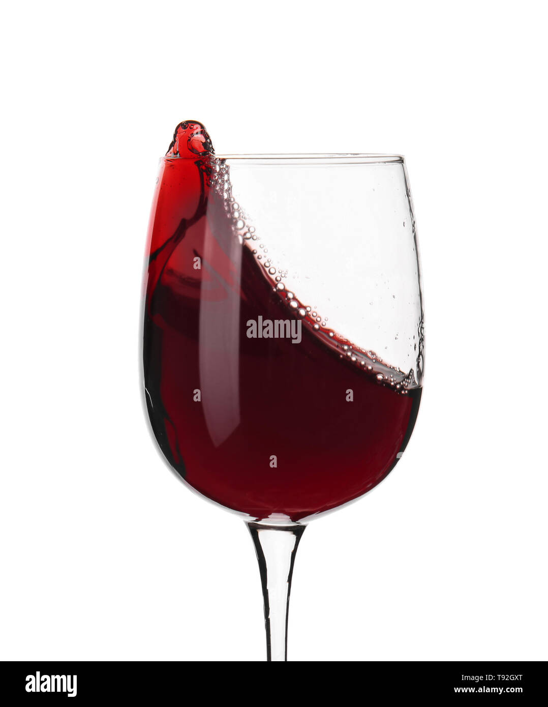 Glass of red wine on white background Stock Photo - Alamy