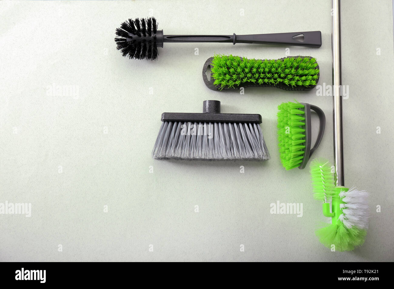 Flat lay composition with cleaning supplies on light background Stock ...