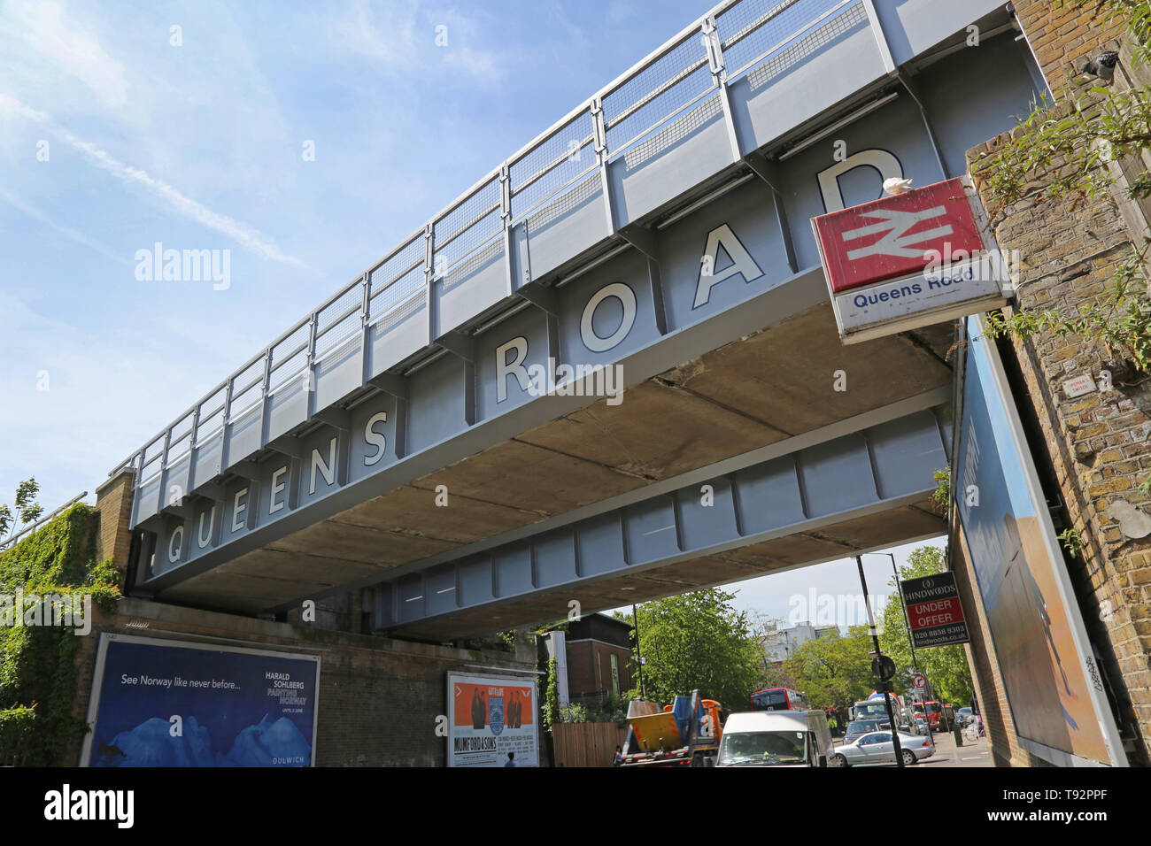 The railway bridge at Queens Road station in Peckham, southeast London. The latest part of this once poor area to become trendy and fashionable. Stock Photo