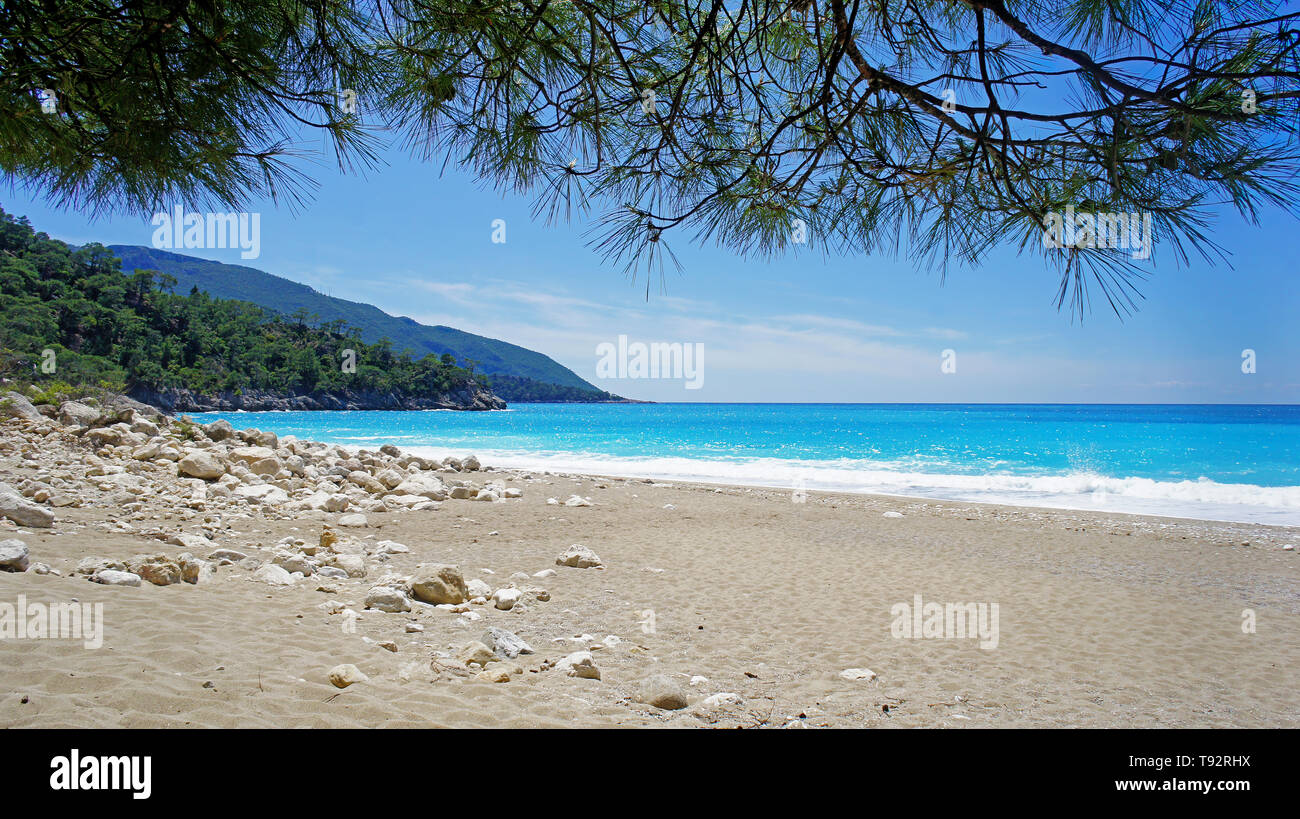 Beautiful beach with clear sand and turquoise water in mediterranean sea in Turkey Stock Photo
