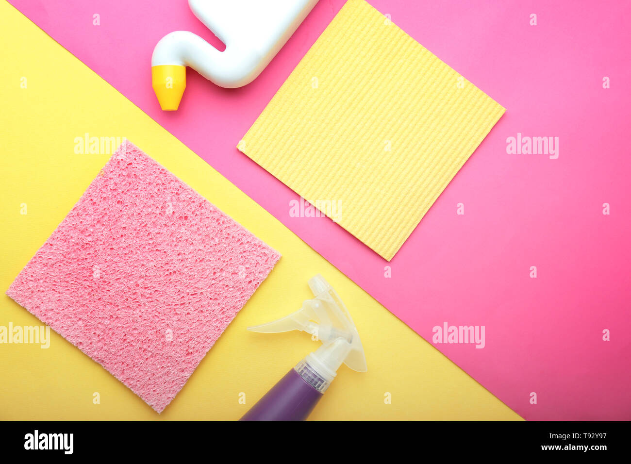 Flat lay composition with cleaning supplies on color background Stock ...