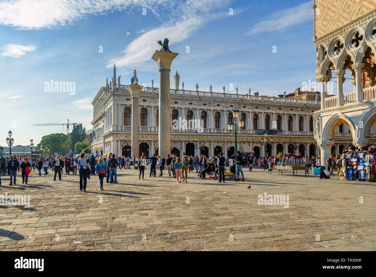 Venice, Italy - October 23, 2018: View of National Library of St Mark's and Saint Mark column on Piazza San Marco Stock Photo
