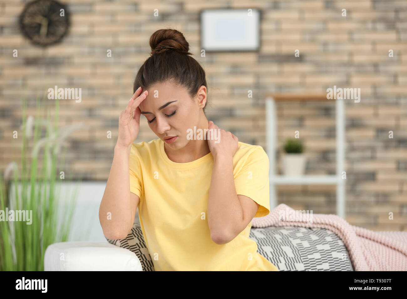 Terrible headache woman home hi-res stock photography and images - Alamy