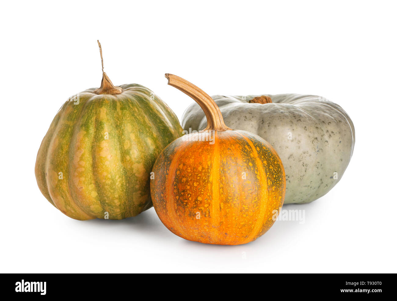 Whole fresh pumpkins on white background Stock Photo - Alamy