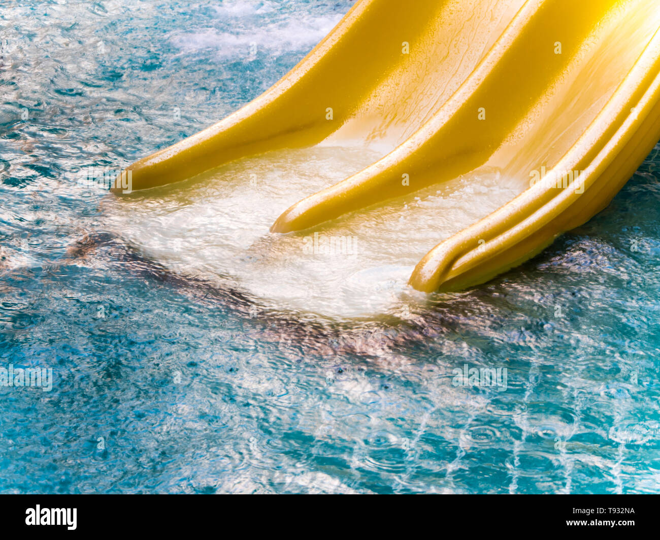 Yellow water slide in the water park Stock Photo Alamy