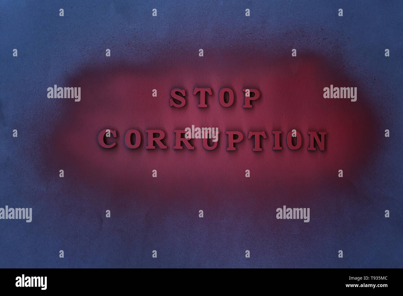 Text STOP CORRUPTION on dark background Stock Photo