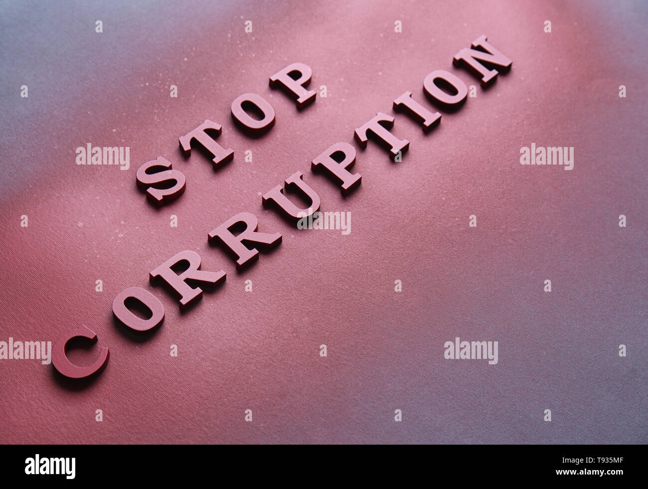 Text STOP CORRUPTION on dark background Stock Photo