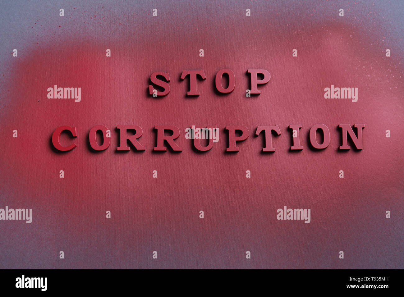 Text STOP CORRUPTION on dark background Stock Photo
