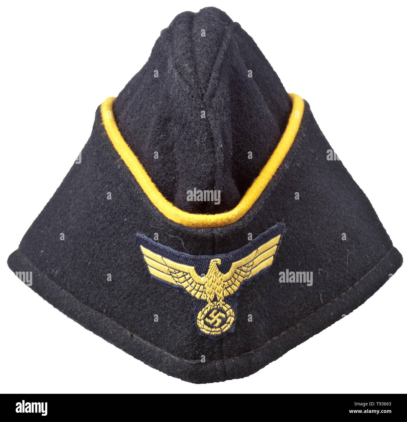 A side cap for naval female auxiliaries Depot piece in navy-blue woollen cloth in the on-board cap cut, continuous yellow wool braid, black inner liner with depot stamping, BeVo weave cap eagle (golden-yellow on dark blue ground). historic, historical, navy, naval forces, military, militaria, branch of service, branches of service, armed forces, armed service, object, objects, stills, clipping, clippings, cut out, cut-out, cut-outs, 20th century, Editorial-Use-Only Stock Photo