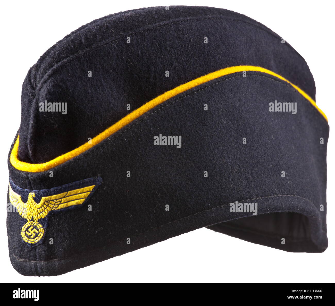 A side cap for naval female auxiliaries Depot piece in navy-blue woollen cloth in the on-board cap cut, continuous yellow wool braid, black inner liner with depot stamping, BeVo weave cap eagle (golden-yellow on dark blue ground). historic, historical, navy, naval forces, military, militaria, branch of service, branches of service, armed forces, armed service, object, objects, stills, clipping, clippings, cut out, cut-out, cut-outs, 20th century, Editorial-Use-Only Stock Photo