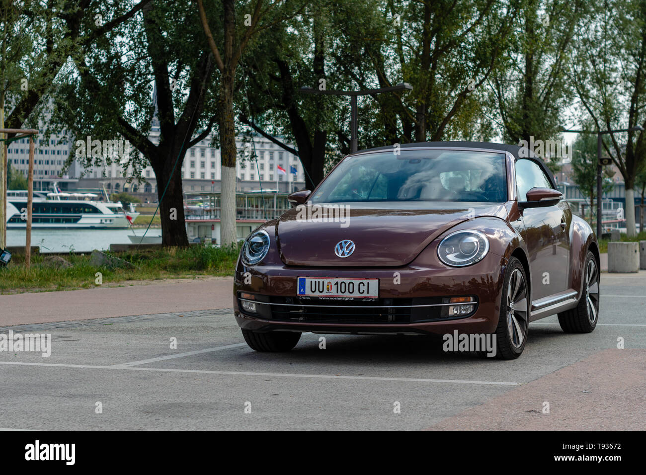 LINZ, AUSTRIA - AUGUST 02, 2018:   Side View Of Brown Volkswagen New Beetle Cabriolet Car Parked In Street. Stock Photo