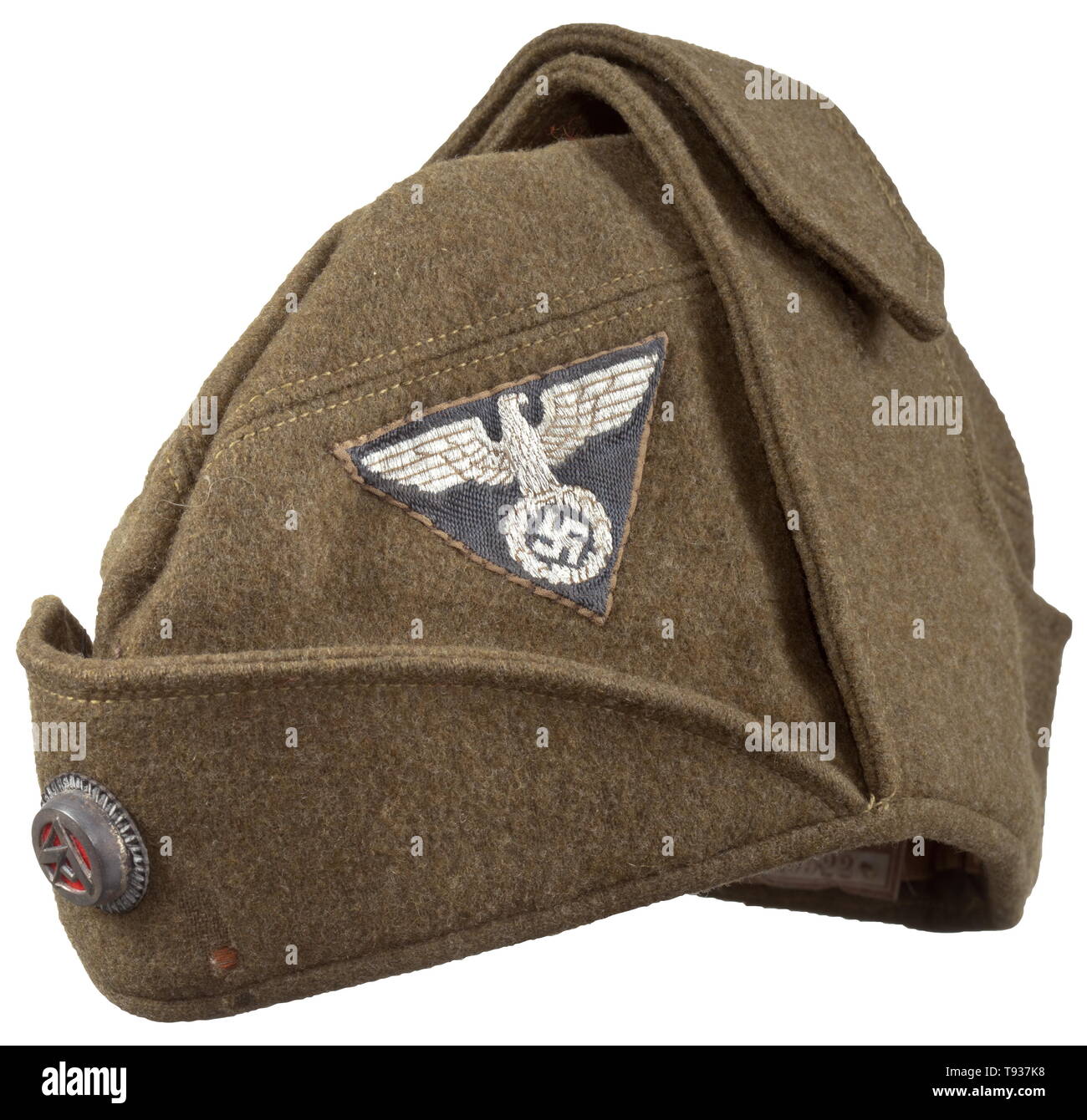 A service cap 'Feldmütze' for military training defense units of the SA Depot piece in olive-coloured woollen cloth, fold-down ear protectors, brown inner liner with sewn-in RZM tag 'Feldmützen. Vorschrift', BeVo weave party eagle on grey ground, multi-part SA cockade. Traces of usage and age. historic, historical, 20th century, Editorial-Use-Only Stock Photo
