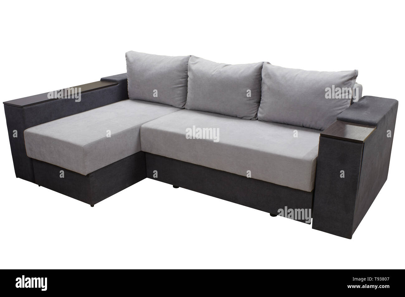 modern stylish two-color corner sofa with pillows Stock Photo