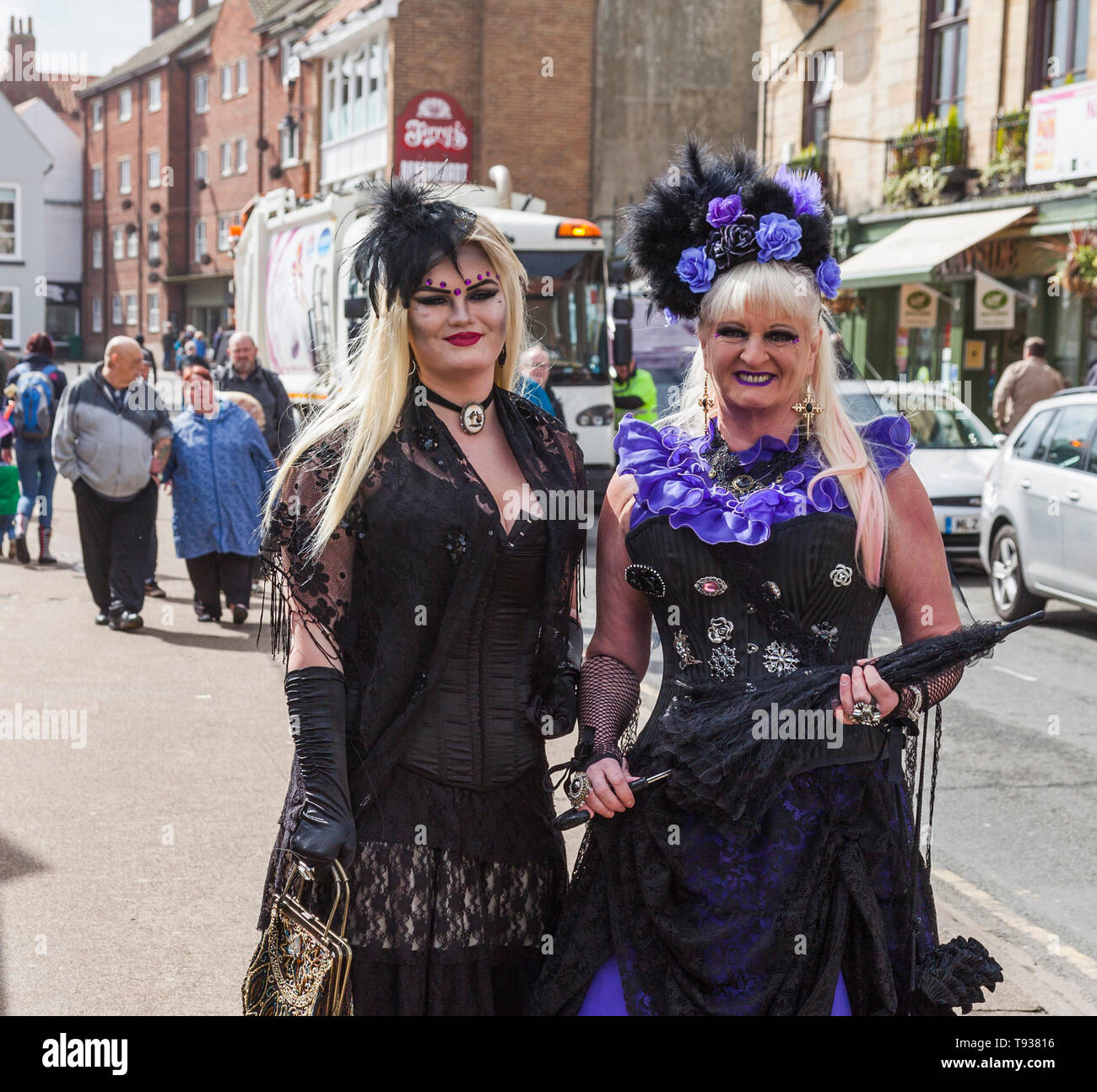Two women dressed up as Steampunks / Goths for the Goth weekend in Whitby,North Yorkshire,England,UK Stock Photo