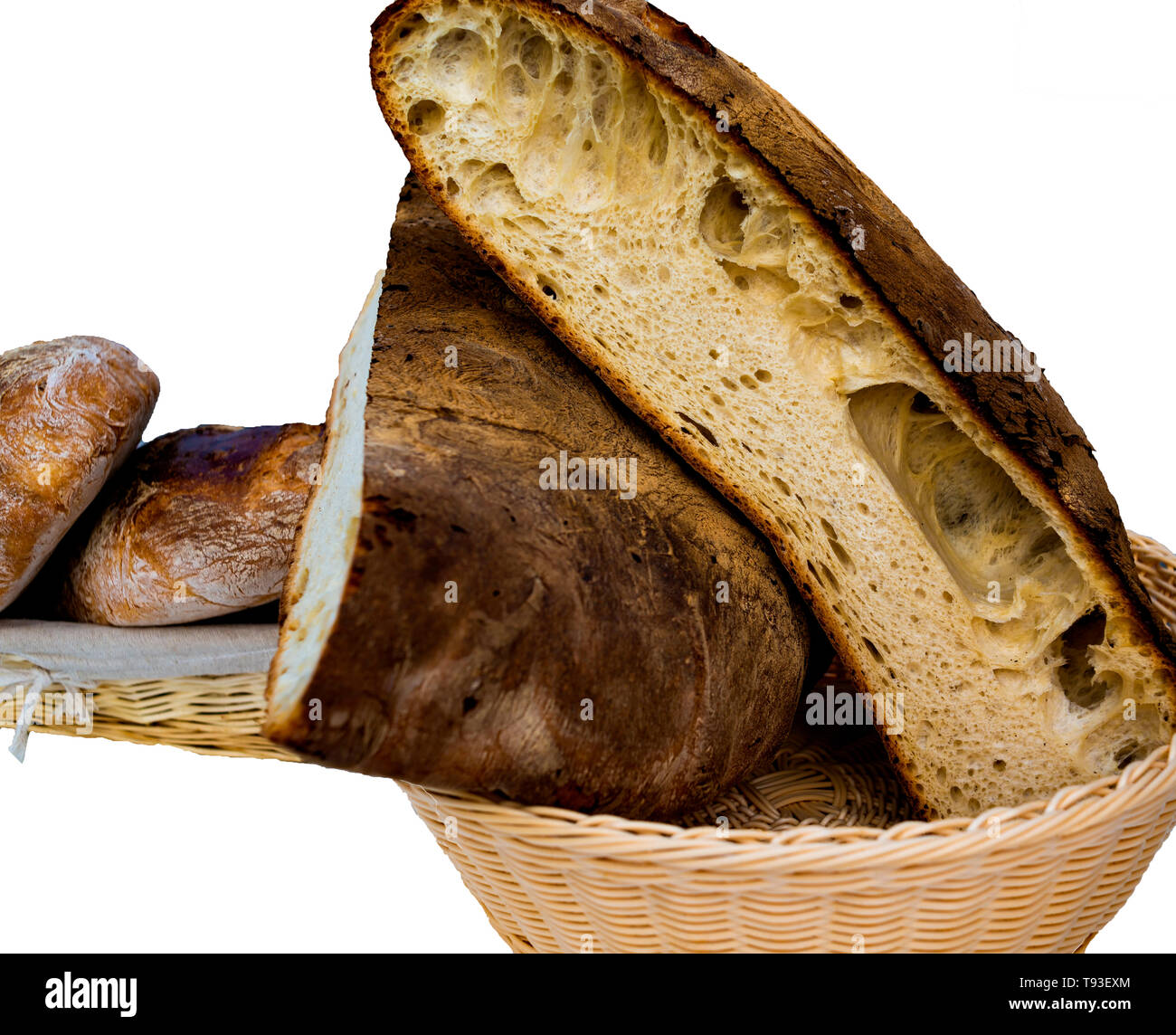 Fresh whole grain apulian bread cut in half on white background Stock Photo