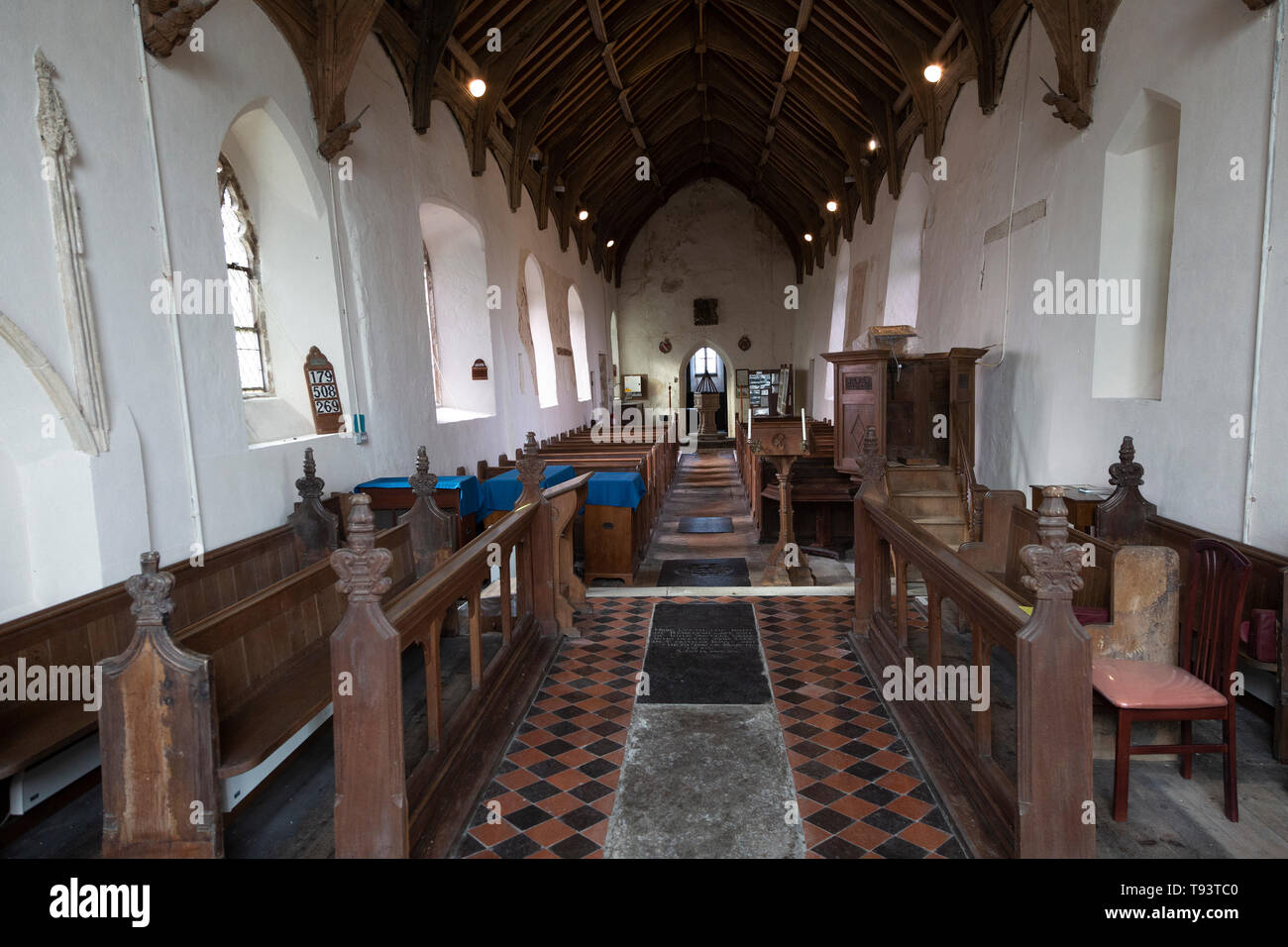 Pews in nave of church of Ilketshall St Andrew, Suffolk, England, UK Stock Photo