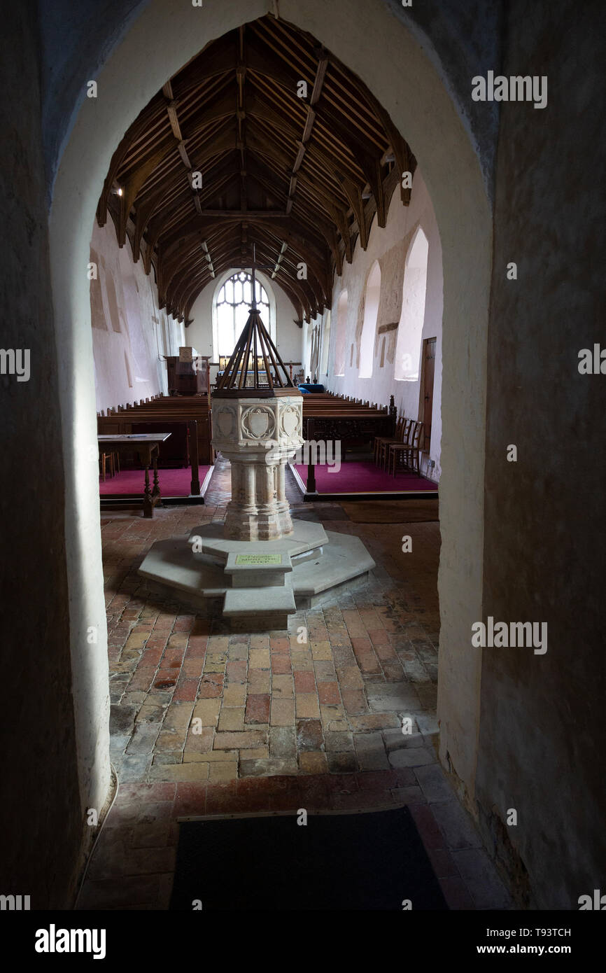 Baptismal font in church of Ilketshall St Andrew, Suffolk, England, UK Stock Photo