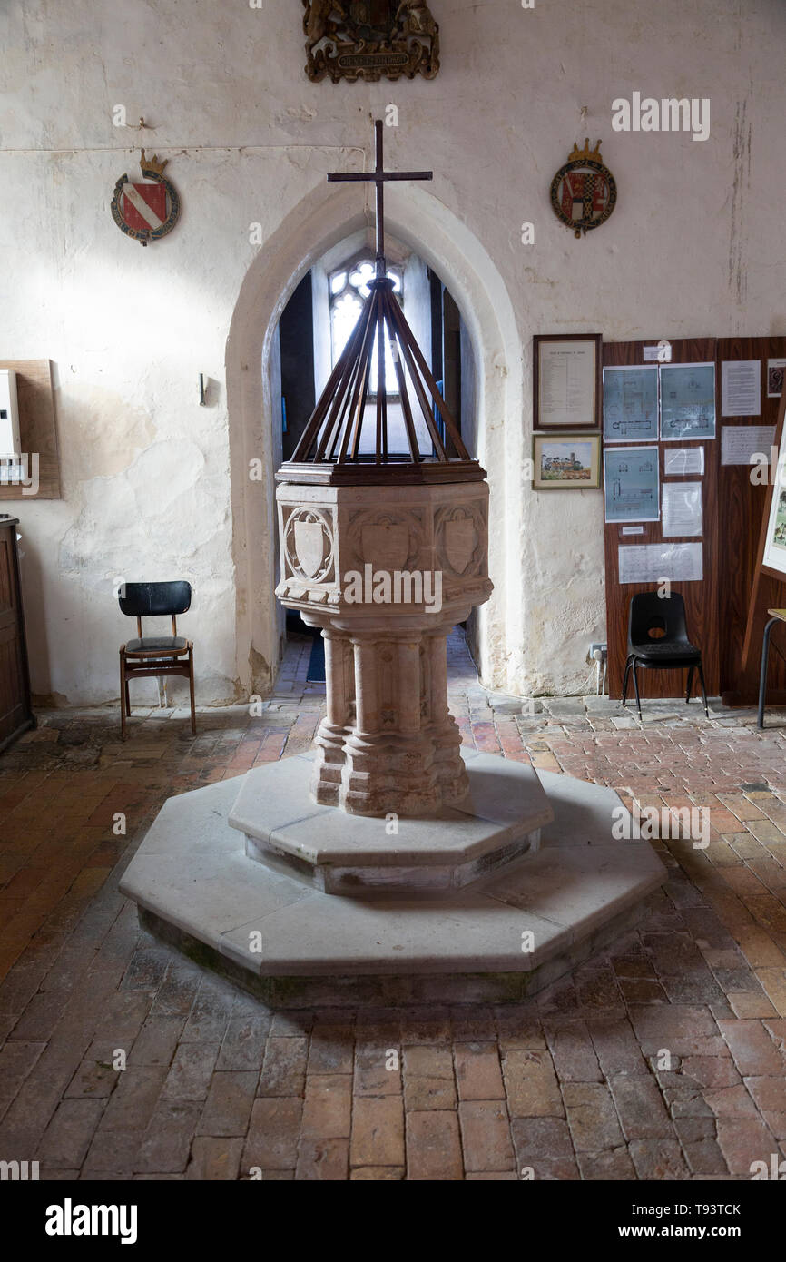 Baptismal font in church of Ilketshall St Andrew, Suffolk, England, UK Stock Photo