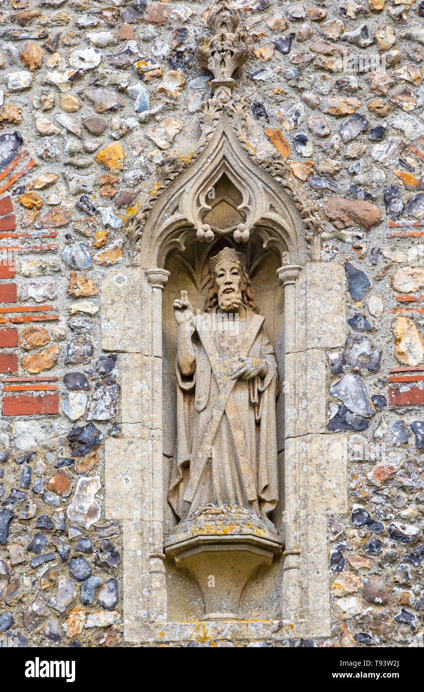 Stone statue of Saint Andrew church of Ilketshall St Andrew, Suffolk, England, UK Stock Photo