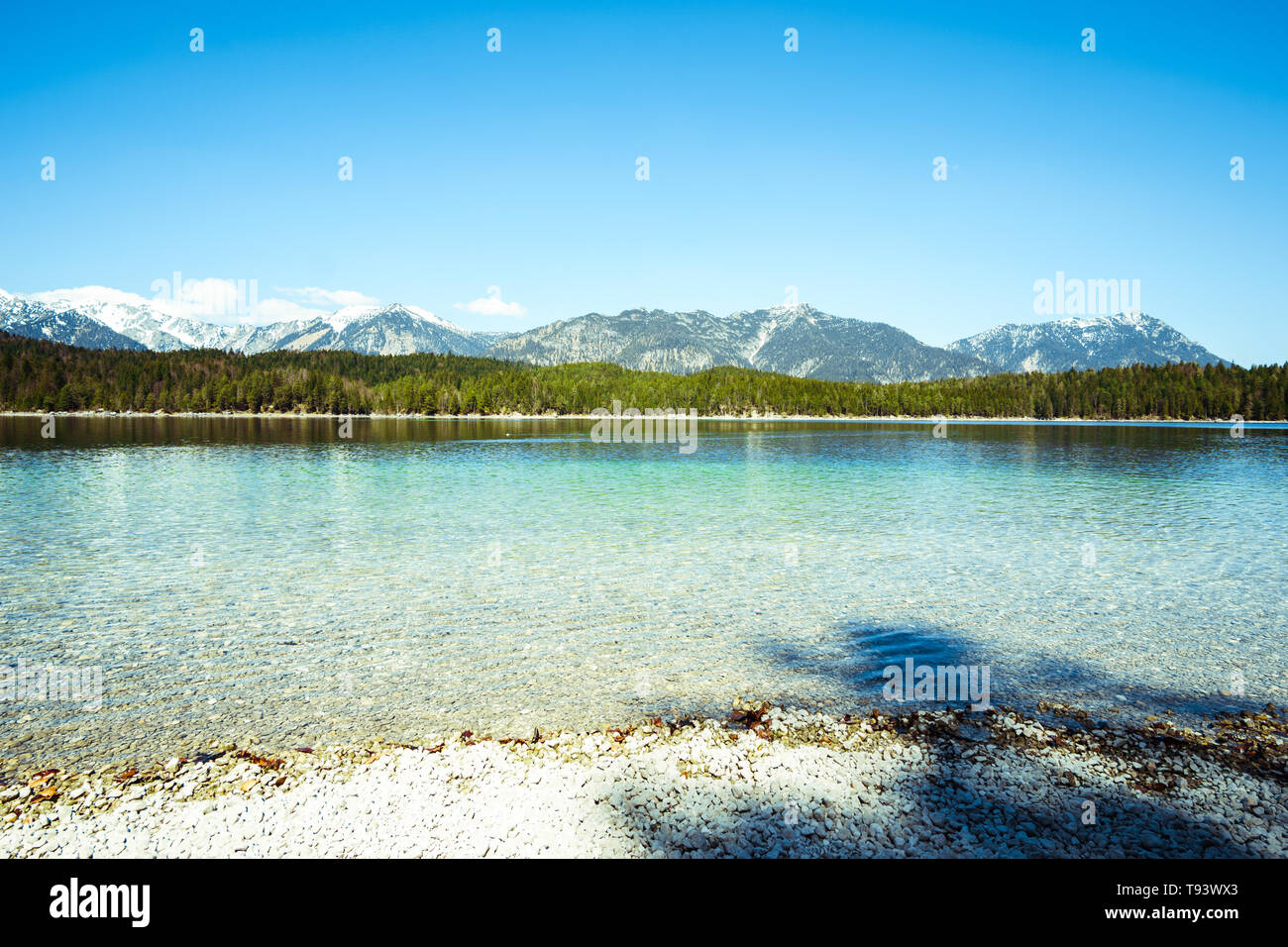 famous eibsee lake in front of zugspitze mountain in germany Stock Photo