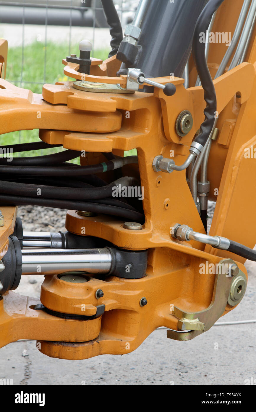 Swivel and hydraulic hoses on a modern tractor. Stock Photo