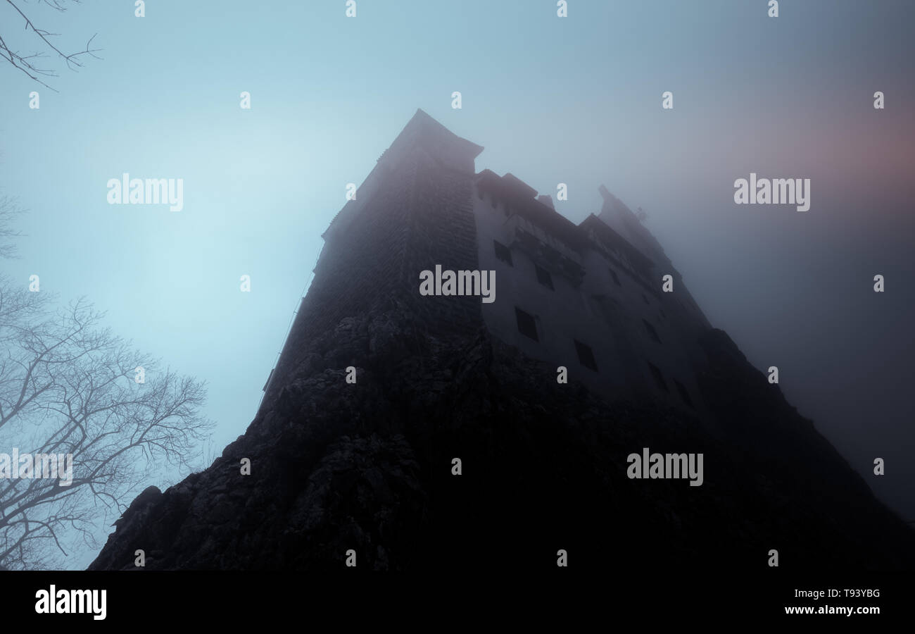 Imposing. Seaworthy. With a rich history. This is Bran Castle, surprised at a good time, when it is foggy outside, to prove it is not a certain castle Stock Photo