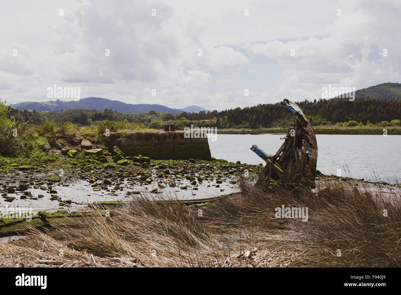 Abandoned boat in a beach Stock Photo Alamy