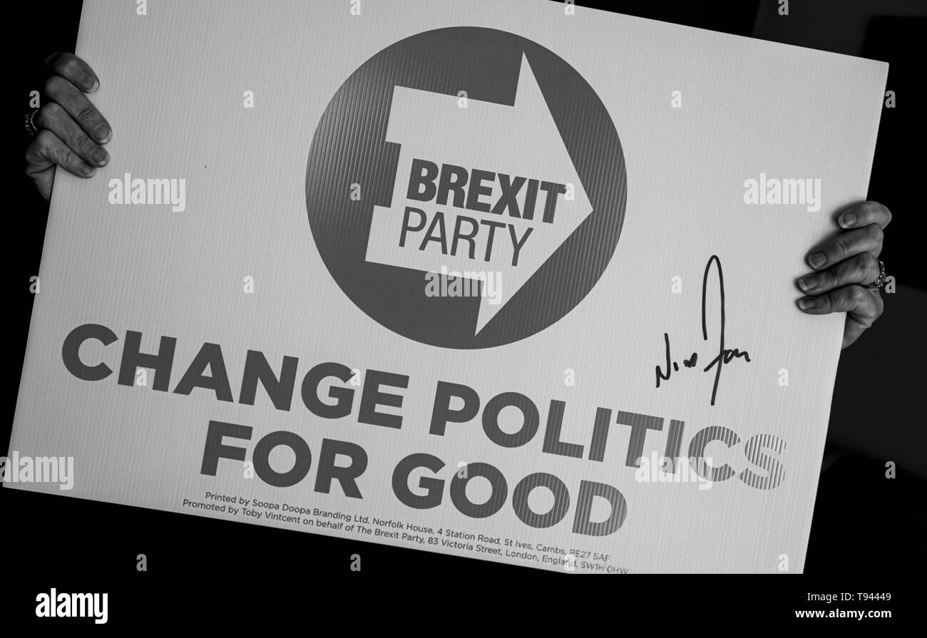 Campaign Sign for The Brexit Party in Black and White Held by Unseen Person Stock Photo