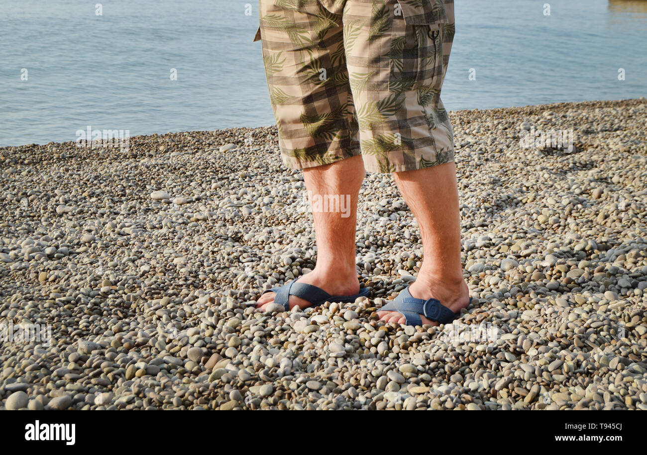 male feet in flip flops