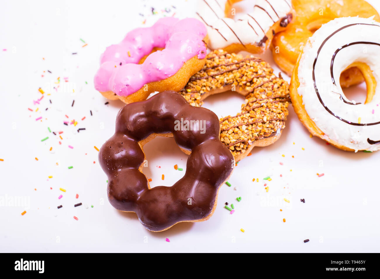 Colorful Donuts on white  background. Stock Photo