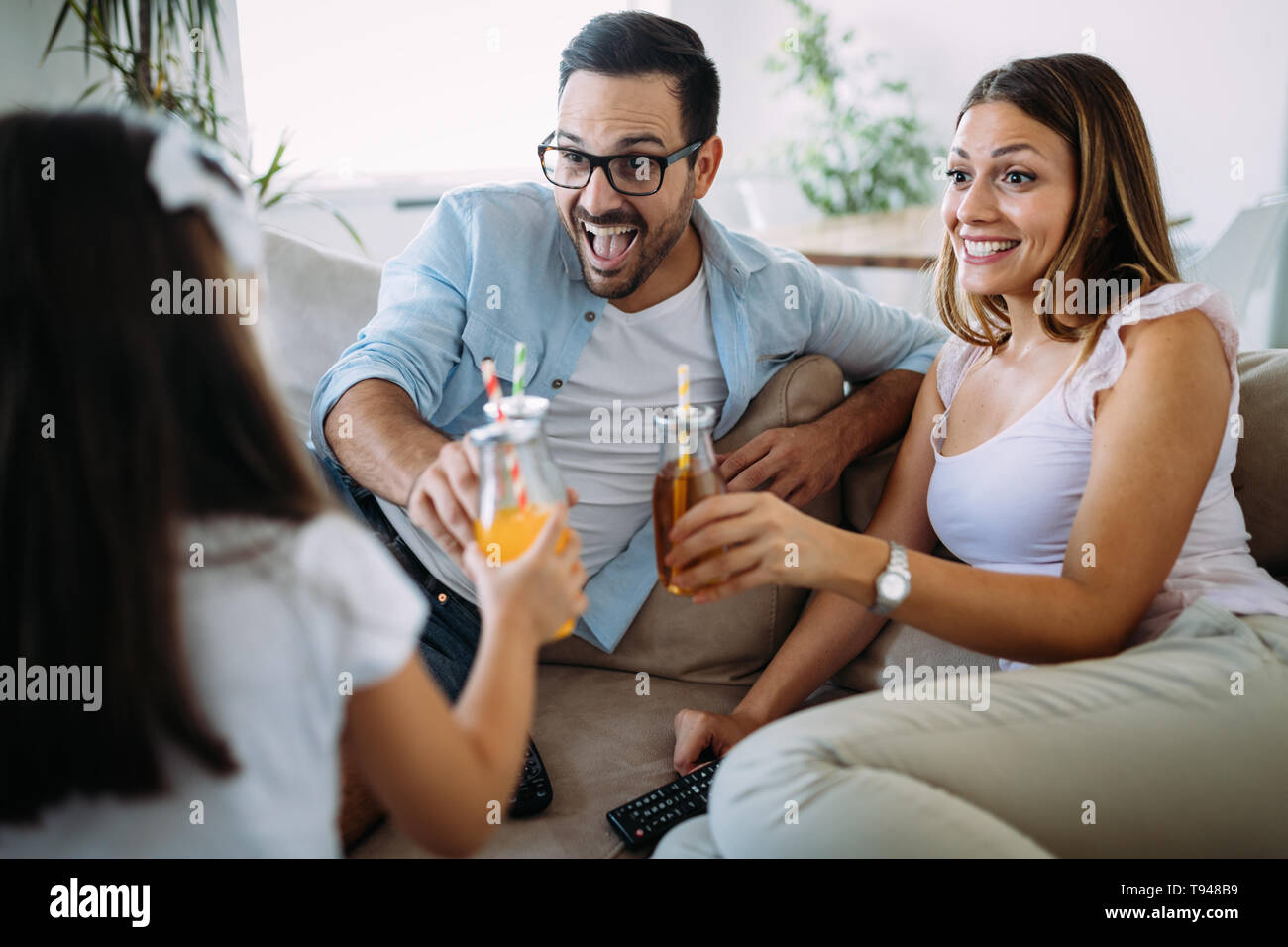 Happy family having fun time at home Stock Photo
