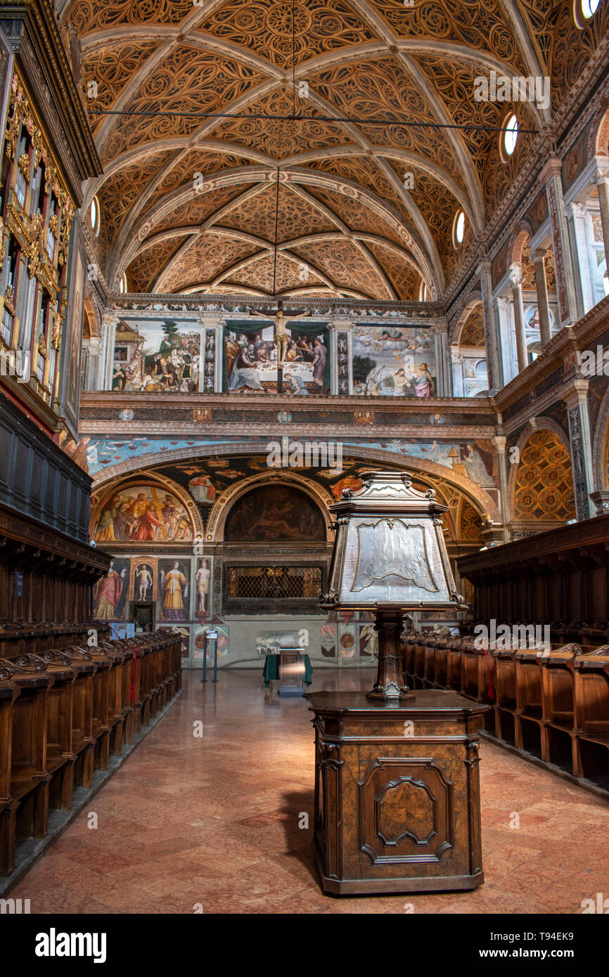 Milan, Italy: inside San Maurizio al Monastero Maggiore, a 1518 church known as the Sistine Chapel of Milan, choir and benches in the Hall of nuns Stock Photo