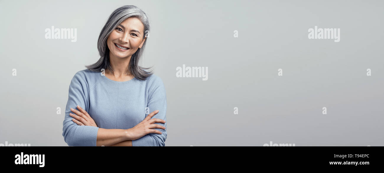 Older asian woman hair hi-res stock photography and images - Alamy