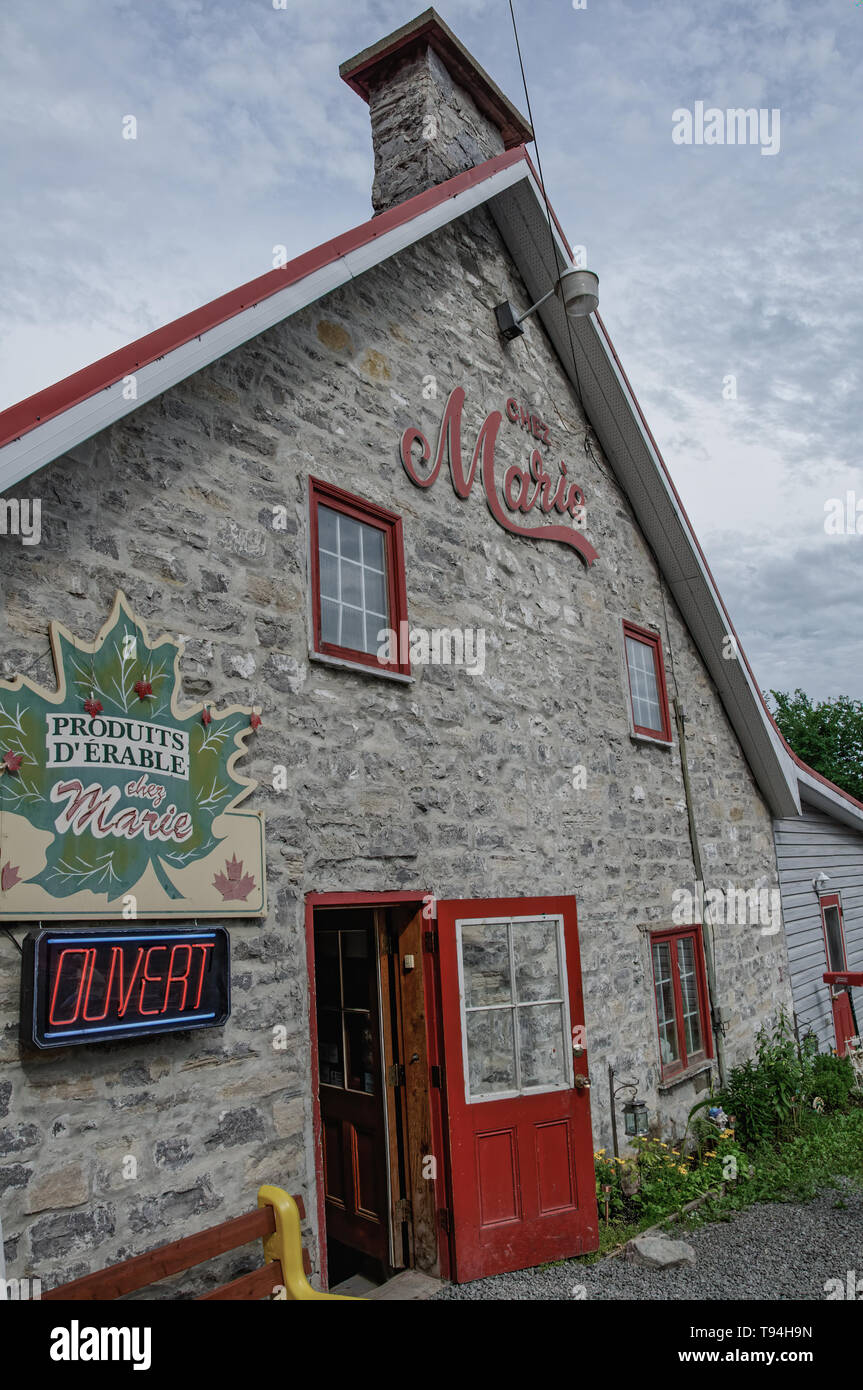 Château-Richer, Quebec/Canada - June 24, 2010: This stone house built in 1652 is home to Chez Marie, a bakery well known for its slice of homemade bre Stock Photo