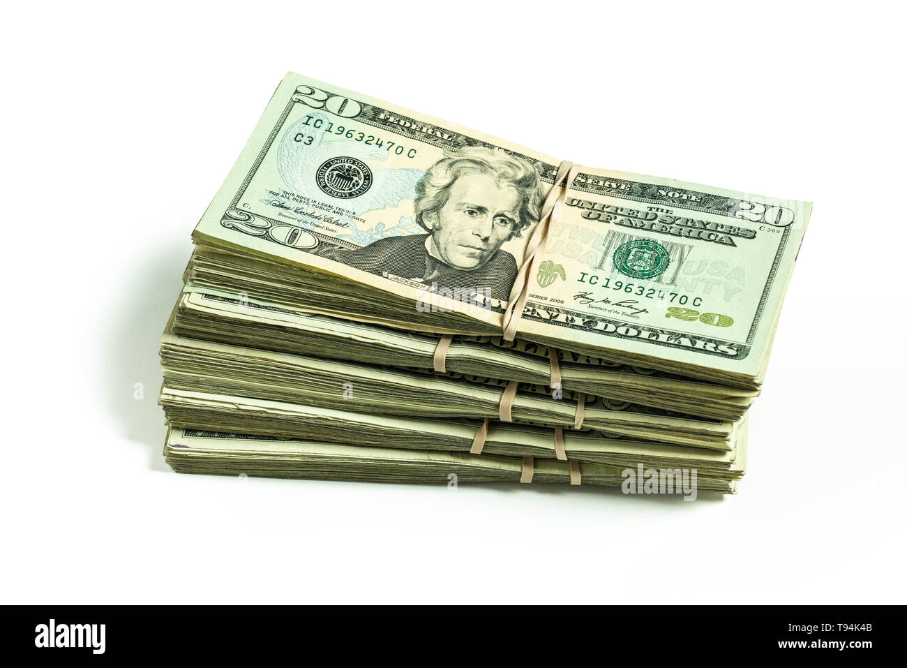pile of US currency twenty dollar bills featuring Andrew Jackson bundled  with rubber bands Stock Photo - Alamy