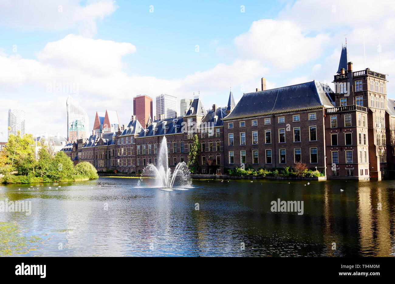 The Binnenhof, the centre of the Dutch Government & Parliament, one of the oldest Parliament buildings still in use, with skyscrapers behind Stock Photo