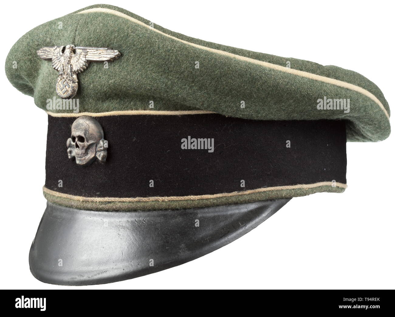 A visor cap for a non-commissioned officer in the Waffen-SS Made from field-grey woollen cloth, black cloth trim band, white piping, dark brown inner liner (cap trapezoid missing), brown leather sweatband (contemporary substitution), vulcanised fibre visor (re-stitched at the time), early cupal insignia (tarnished). Signs of usage and age. The cap straps were removed at the time in order for the visor cap to appear the same as the old style field cap. this act of highhandedness being tolerated only in regards to NCOs of the highest grades. historic, historical, 20th century, Editorial-Use-Only Stock Photo