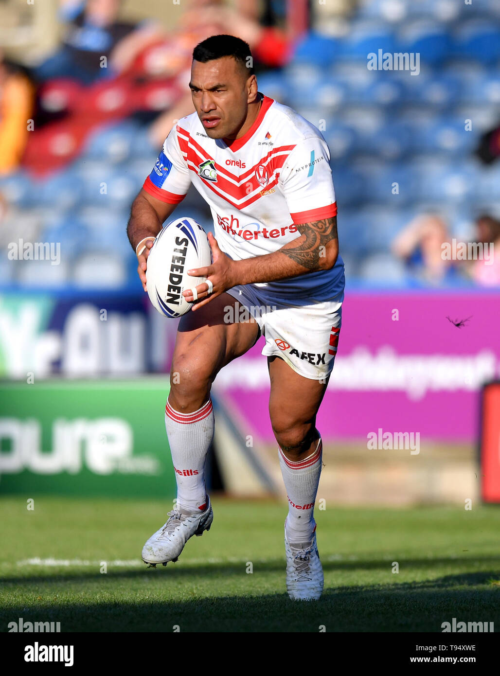 St Helen's Zeb Taia in action during the Coral Challenge Cup match at The John Smith's Stadium, Huddersfield. Stock Photo