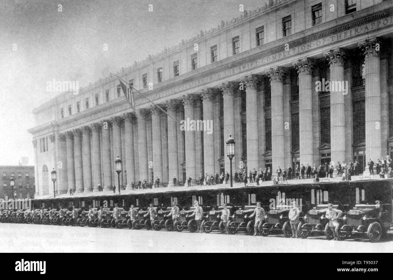 Thirty-three Denby Motor Truck Company three-quarter-ton screen-body trucks were sold to New York City working for the Post Office Department, 1914. The James A. Farley Post Office Building is the main United States Postal Service building in New York City. Its ZIP code designation is 10001. Built in 1912, the building is famous for bearing the inscription: 'Neither snow nor rain nor heat nor gloom of night stays these couriers from the swift completion of their appointed rounds. Stock Photo